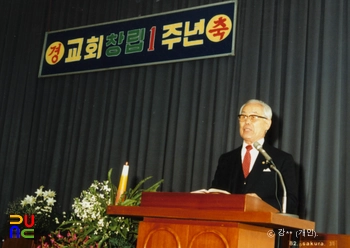 강신명