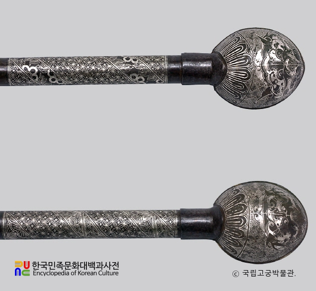 은입사 귀면문 철퇴 부분